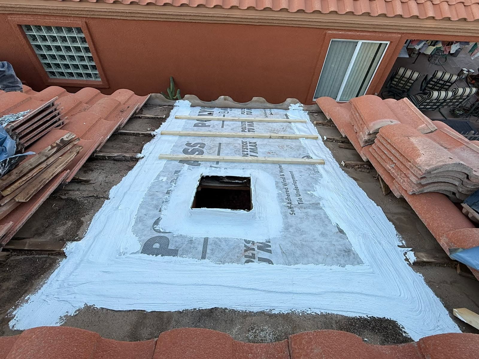 Expert Tile Roof Renovation with Secure Underlayment image