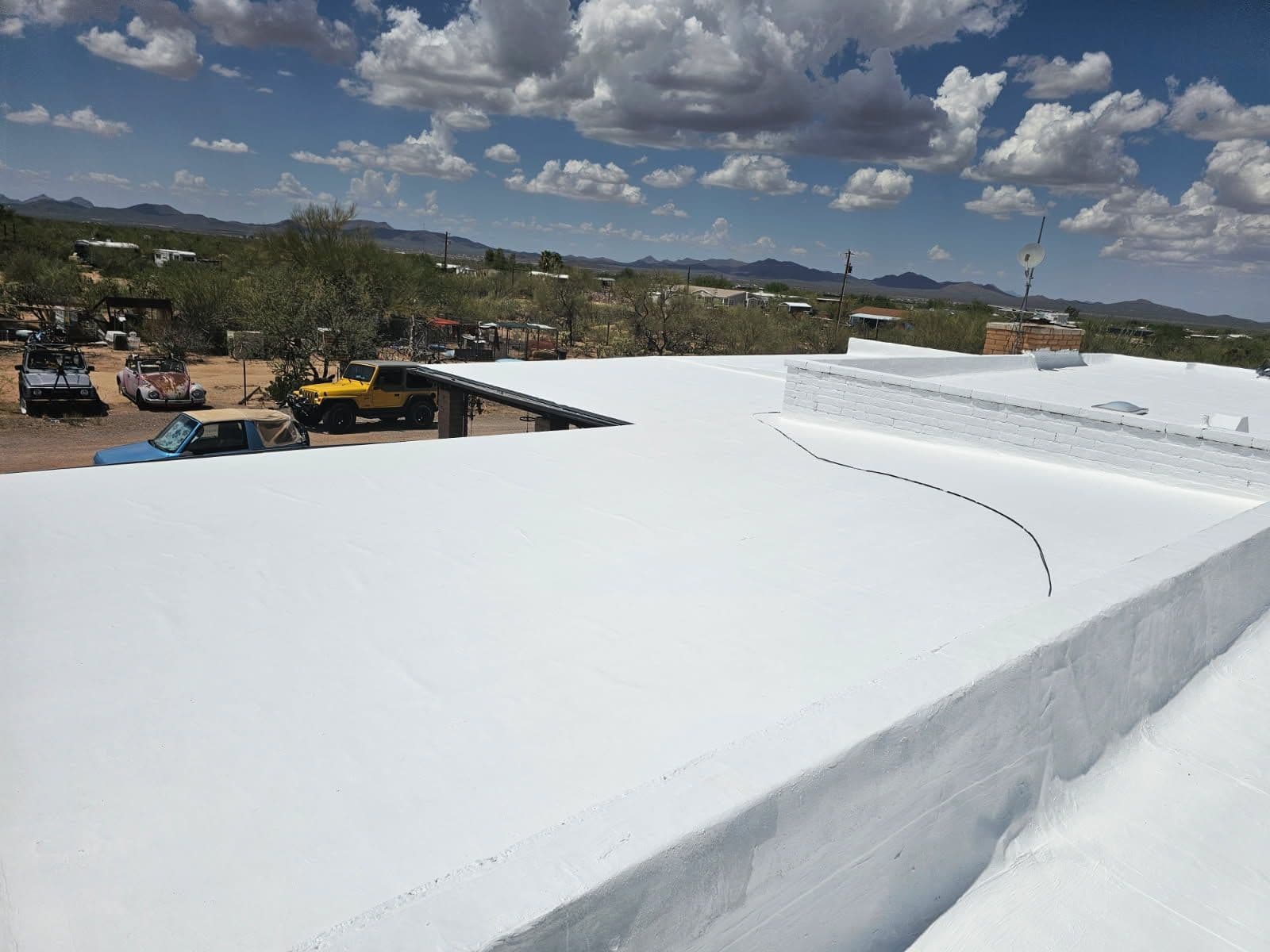 Stay Cool with Our Roof Coating Service image